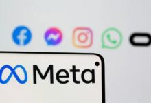 Facebook's new rebrand logo Meta is seen on smartpone in front of displayed logo of Facebook, Messenger, Intagram, Whatsapp and Oculus in this illustration picture taken October 28, 2021. REUTERS/Dado Ruvic/Illustration