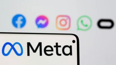 Facebook's new rebrand logo Meta is seen on smartpone in front of displayed logo of Facebook, Messenger, Intagram, Whatsapp and Oculus in this illustration picture taken October 28, 2021. REUTERS/Dado Ruvic/Illustration